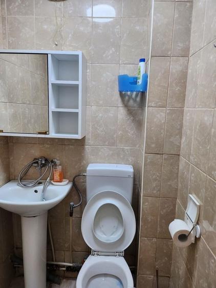 Garsonieră decomandată în Titan