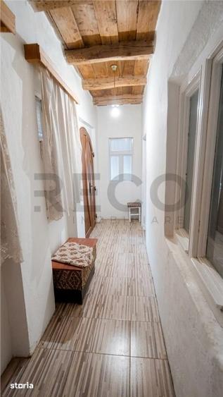 Casă cu 2 camere decomandat cu Teren 1742 Mp în Husasău de Tinca