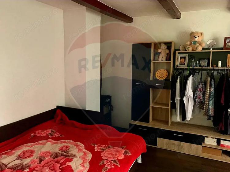 Casă cu Teren 1043 Mp în Dochia