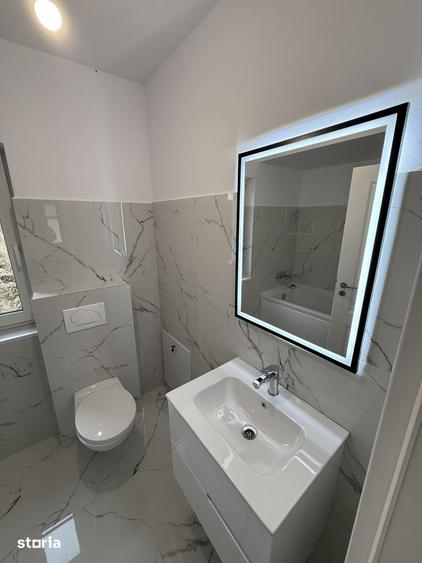 Casă cu 4 camere cu Teren 300 Mp în Bucium