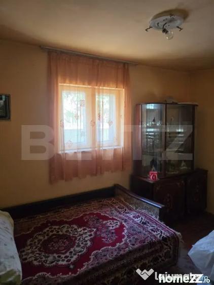 Casă cu 3 camere cu Teren 1100 Mp în Central