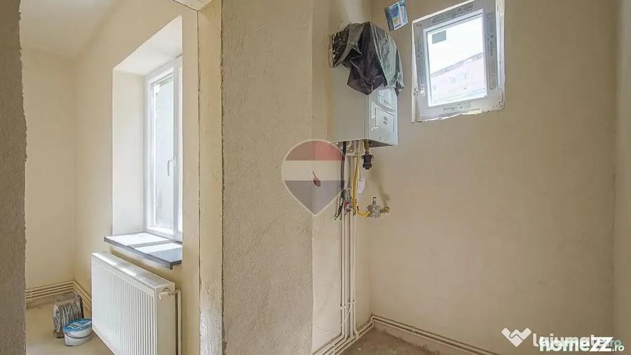 Casă cu 4 camere cu Teren 104 Mp în Centrul Civic