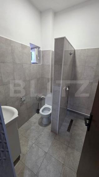 Apartament cu 4 camere semidecomandat în Central