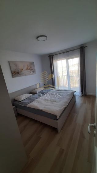 Apartament cu 4 camere semidecomandat, mobilat în Borhanci