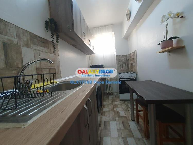Garsonieră decomandată în Titan