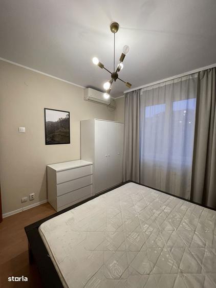 Apartament cu 3 camere decomandat în Romană