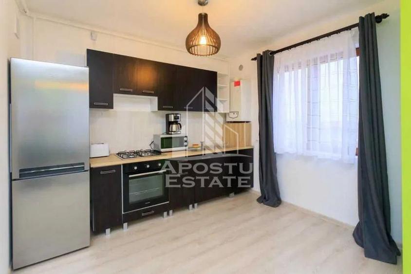 Apartament cu 2 camere semidecomandat, mobilat în Torontalului