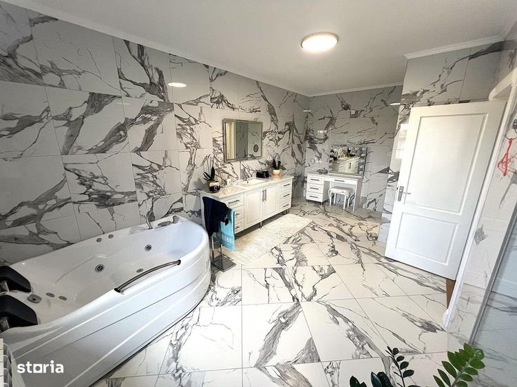 Casă cu 4 camere cu Teren 1500 Mp în Halmeu