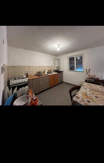 Casă cu 4 camere cu Teren 412 Mp în Comana