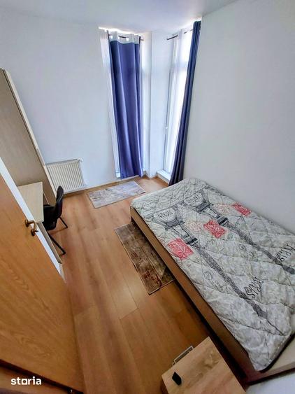 Apartament cu 4 camere semidecomandat în Central