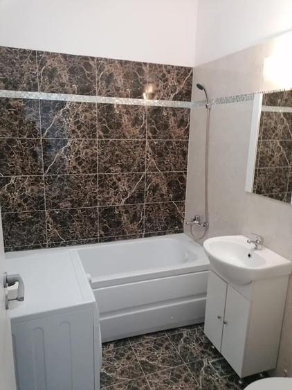 Apartament cu 2 camere semidecomandat, mobilat în Central