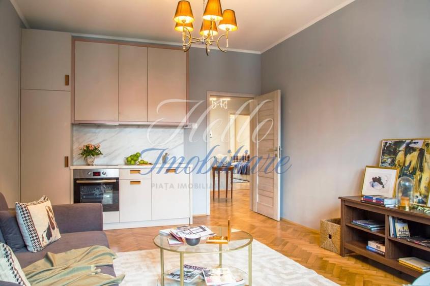 Apartament cu 3 camere semidecomandat, mobilat în Central