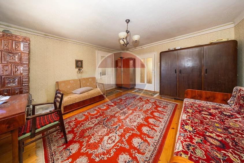 Casă cu Teren 1900 Mp în Central