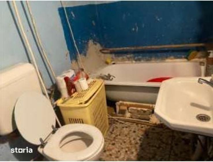 Casă cu 2 camere cu Teren 1400 Mp în Central