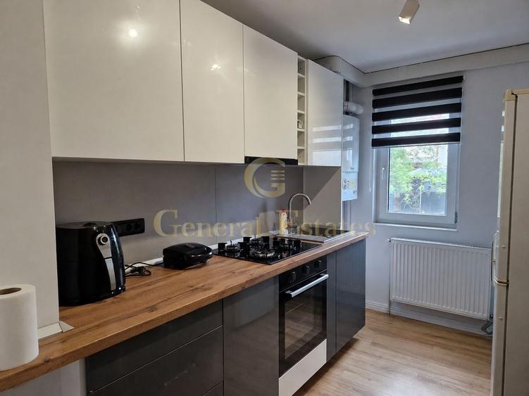 Apartament cu 2 camere semidecomandat, mobilat în Tractorul