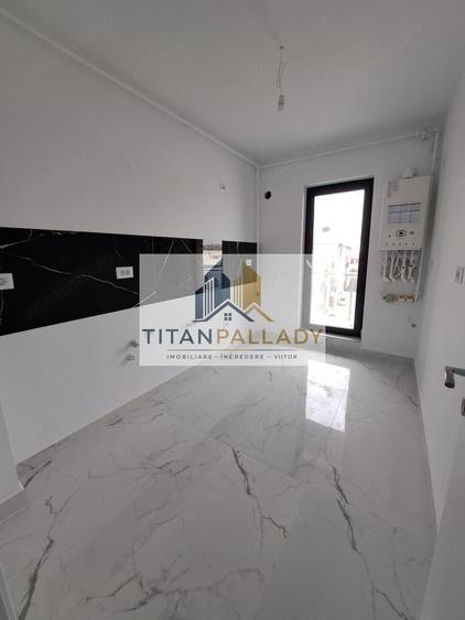 Apartament cu 3 camere decomandat în Titan