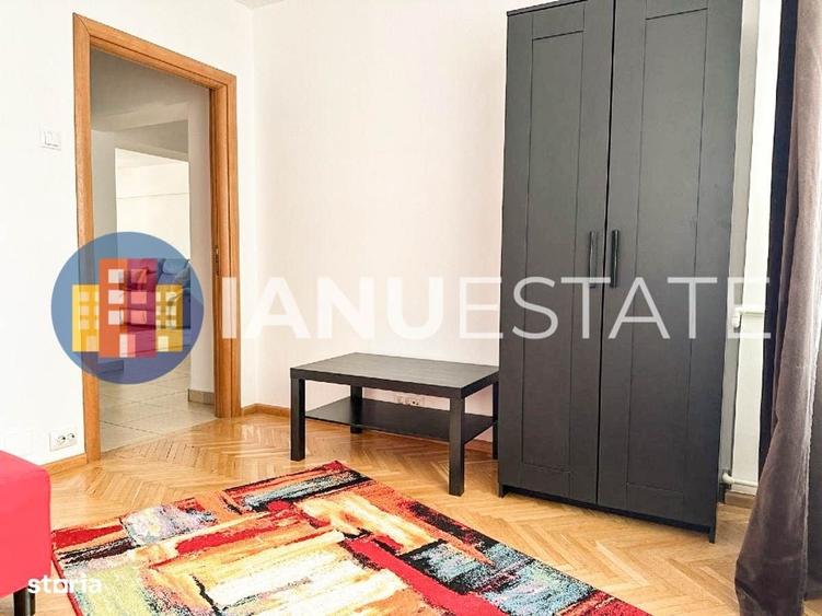 Apartament cu 4 camere decomandat în Romană