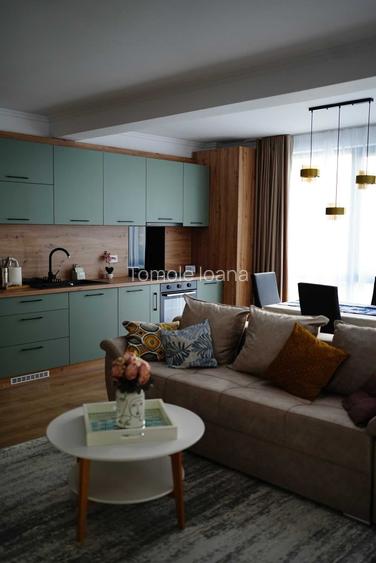 Inchiriez apartament 2 camere si living open space in bloc nou