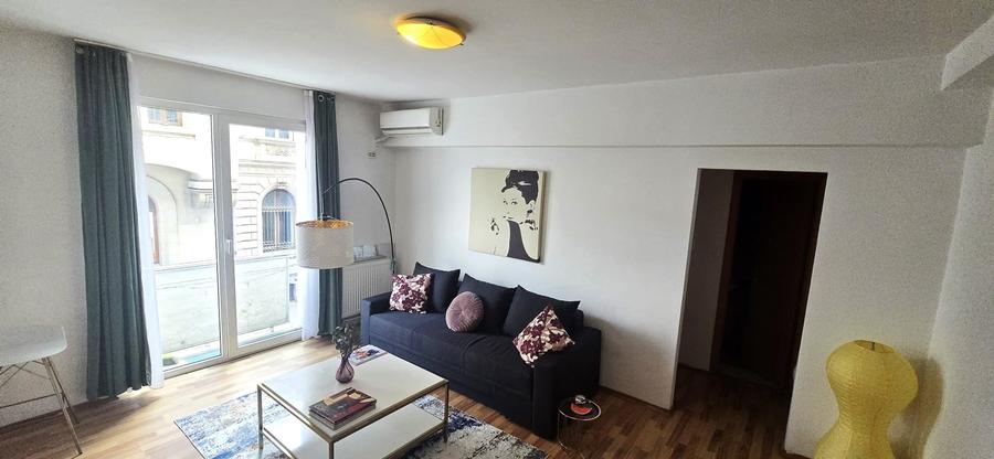 Apartament cu 2 camere semidecomandat în P-ța Universității