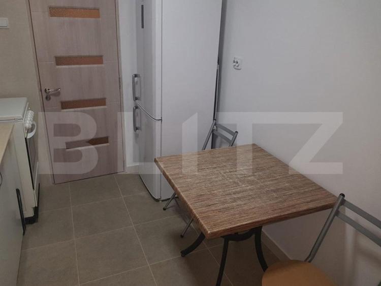 Apartament cu 2 camere semidecomandat, mobilat în Central