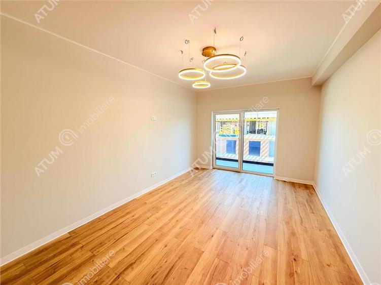 Apartament cu 3 camere decomandat în Șelimbăr — fotografia 2