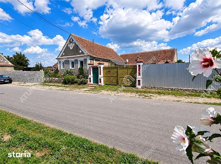 Casă cu 4 camere decomandat cu Teren 1650 Mp în Porumbacu de Jos