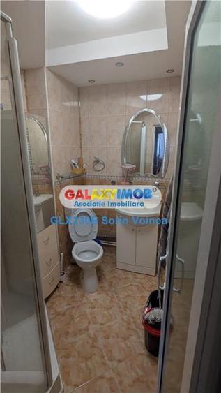 Apartament cu 4 camere semidecomandat, mobilat în Apărătorii Patriei