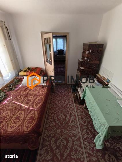 Casă cu 5 camere semidecomandat cu Teren 720 Mp în Gura Dimienii