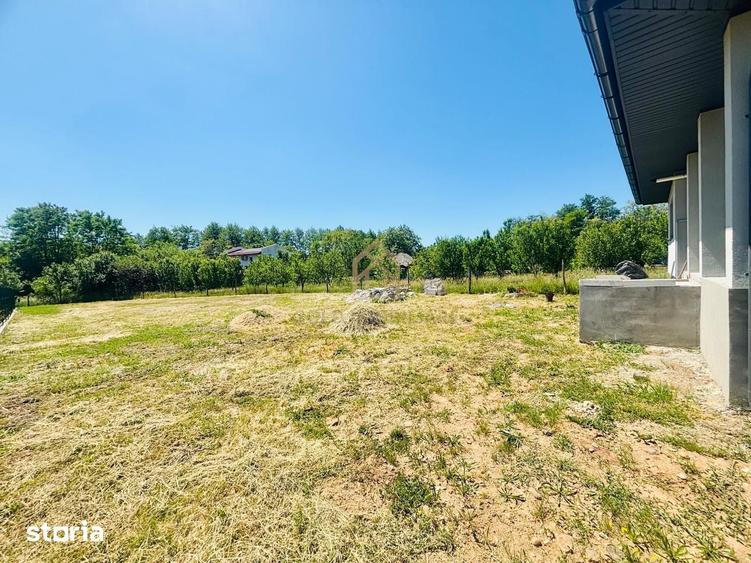 Casa noua, finisata complet, cu teren generos de 1.200 - 4
