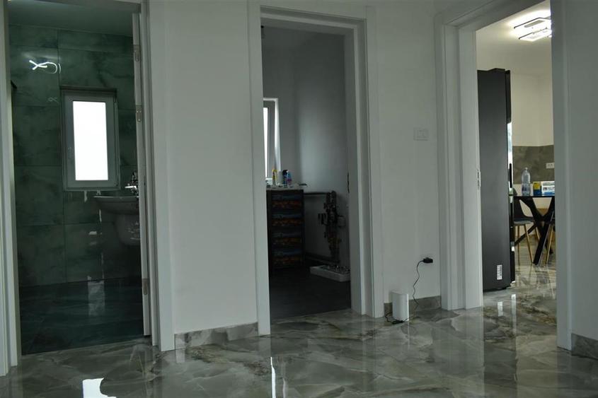 Casă cu 4 camere cu Teren 750 Mp în Aroneanu