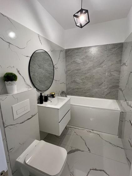 Apartament cu 2 camere semidecomandat, mobilat în Central