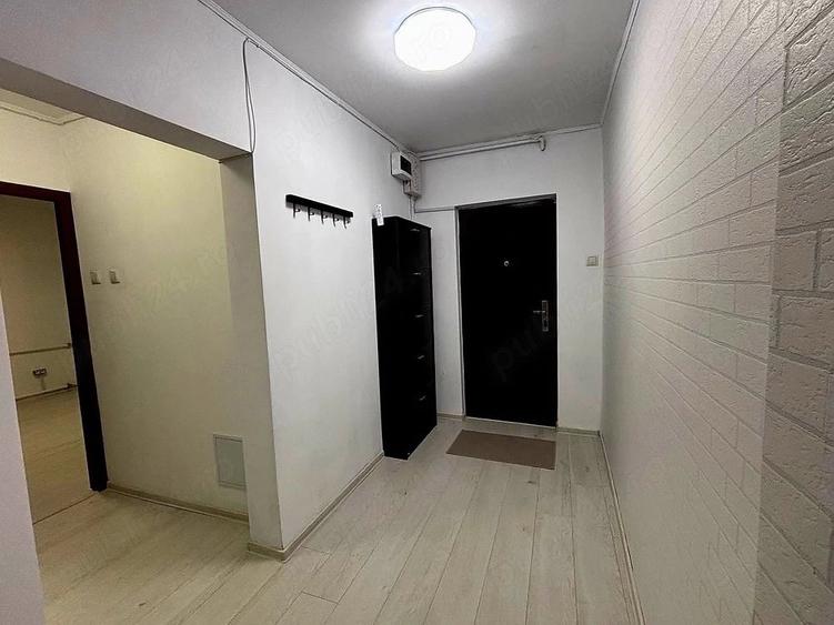 Se ofera spre inchiriere un apartament spa?ios, luminos ?i complet mobilat ?i utilat, situat intr-o - 10