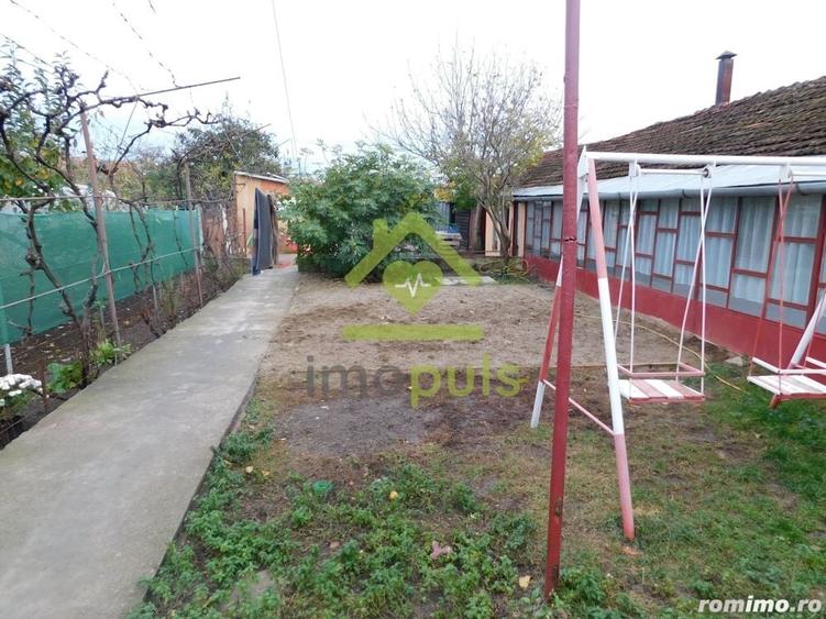 Casa individuala. Teren 1187 mp. Centrala proprie.? - 1