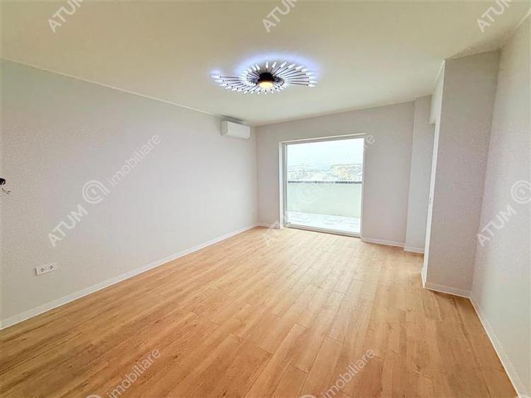 Apartament cu 3 camere decomandat în Șelimbăr — fotografia 3