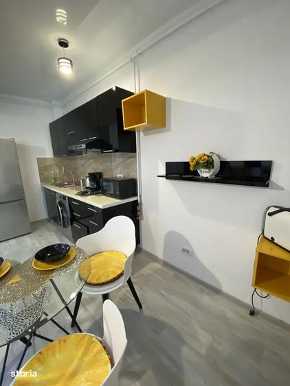 Apartament cu 2 camere, mobilat în Central