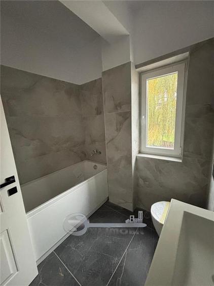 Apartament cu 2 camere semidecomandat în Bucium