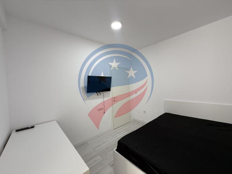 Apartament cu 2 camere semidecomandat, mobilat în 1 Mai