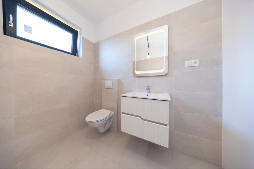 Casă cu 4 camere cu Teren 500 Mp în Central