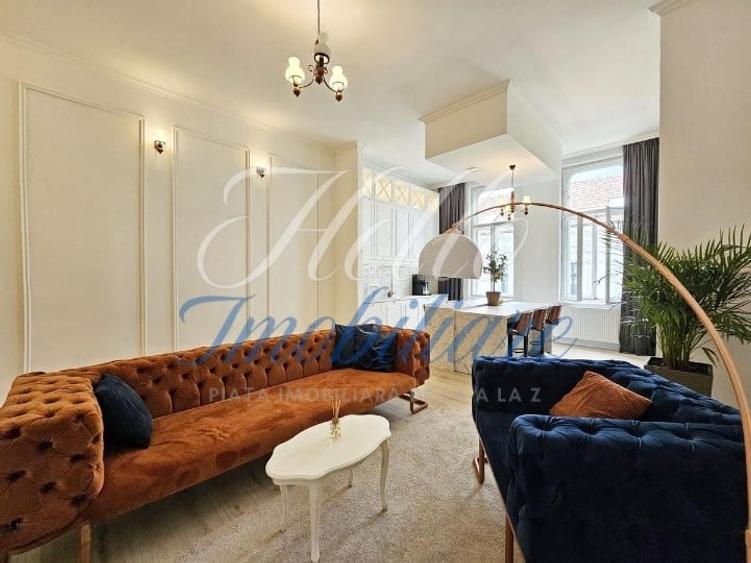 Apartament cu 3 camere semidecomandat, mobilat în Central