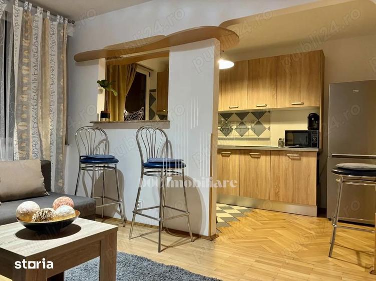Apartament cu 2 camere semidecomandat, mobilat în Centrul Civic