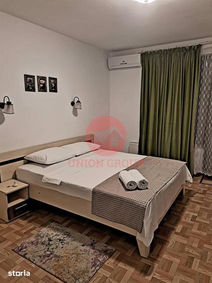 Casă cu 10 camere cu Teren 394 Mp în Central