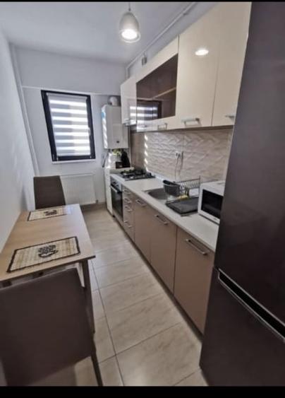 Apartament cu 2 camere decomandat, mobilat în Basarabia