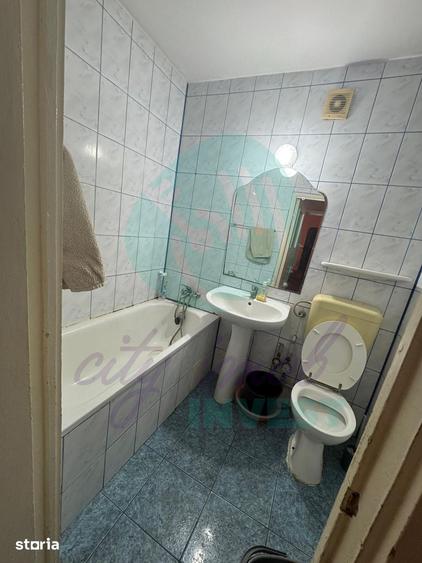 Apartament cu 3 camere semidecomandat în Ozana