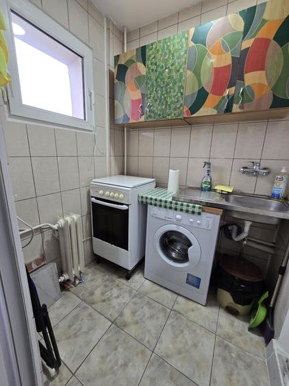 Garsonieră decomandată în Titan