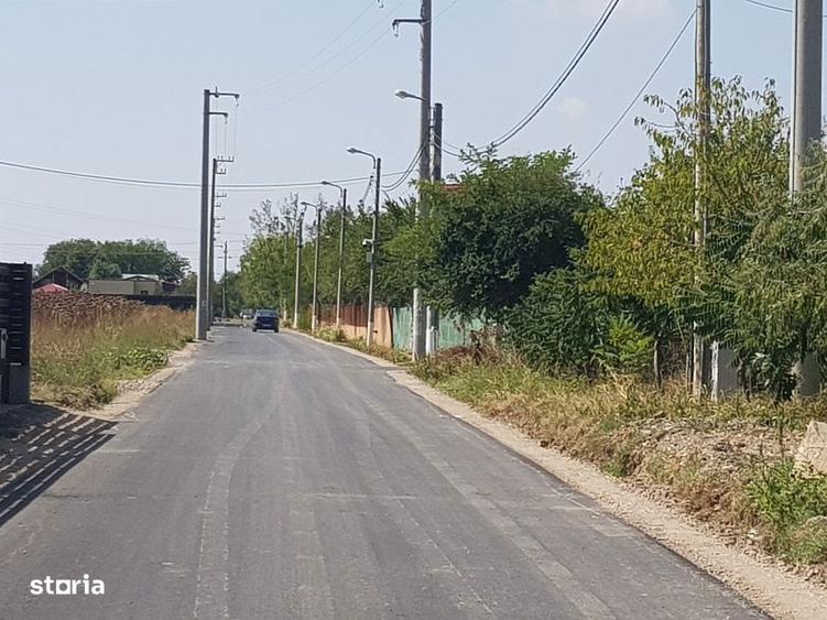 Vanzare teren langa padure,drum amenajat,case noi ,620 mp,26500 E - 5