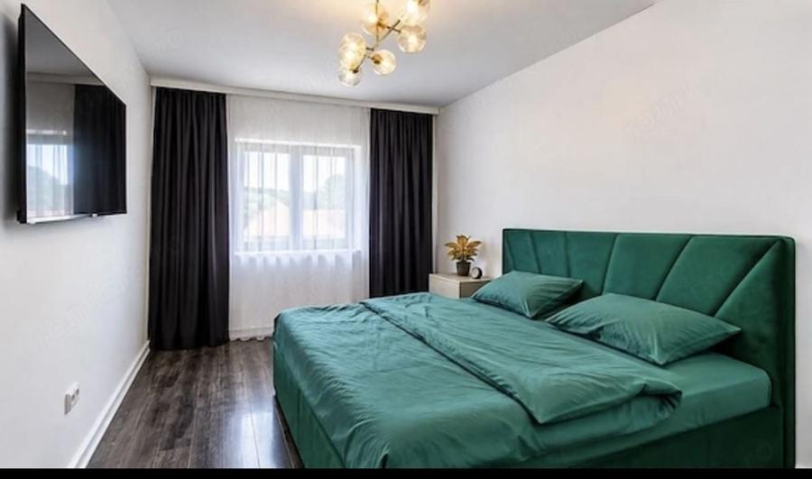 Casă cu 4 camere semidecomandat în Tărlungeni