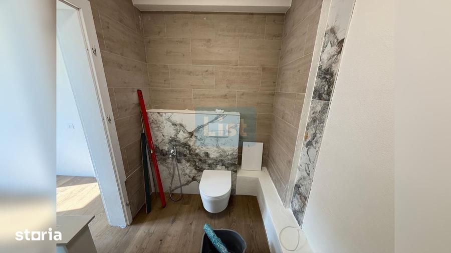 Apartament cu 3 camere semidecomandat în Borhanci
