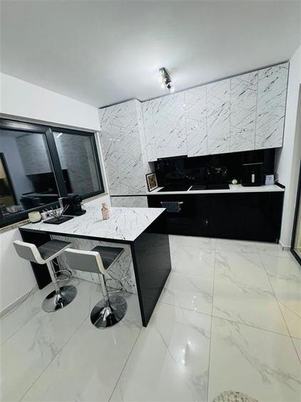 Apartament cu 2 camere semidecomandat, mobilat în Calea București