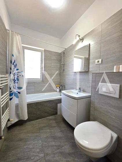 Apartament cu 3 camere decomandat în Buziașului