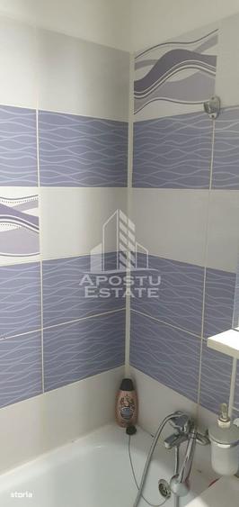 Apartament cu 3 camere semidecomandat, mobilat în Dacia